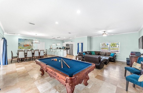Port Canaveral House | 4 Bed 4 bath Beach House Slps 15! Htd Pool, Hot tub, Pool/Ping Pong, Golf Cart