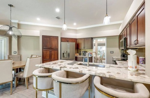 Boyette Springs House | Private Oasis: Heated Pool & Spa