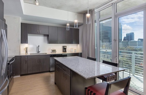 Civic District Condo | Studio unit/Austin - Full Kitchen, W/D, Rooftop Pool, & More!