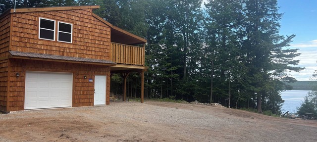 Completely updated one bedroom cabin with a hot tub on AuTrain Lake in Au Train