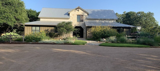Dog-Trot Home on secluded acreage with pool and game room. in Spring Branch