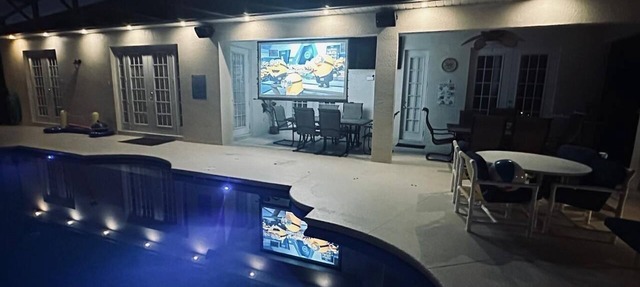 Luxury Villa Disney 2 mls 7BR 40 ft Pool, Huge Spa, Cinema, Lake Views, Slps 16. in Kissimmee