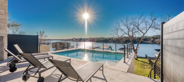 NEW Lakefront Luxury with game room, heated pool, fire pit, & fitness equipment in Burnet