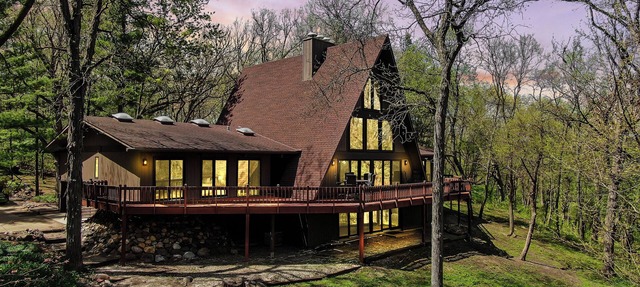 Spacious A-Frame sleeps 25 on 5 wooded acres with a private fishing pond in McHenry