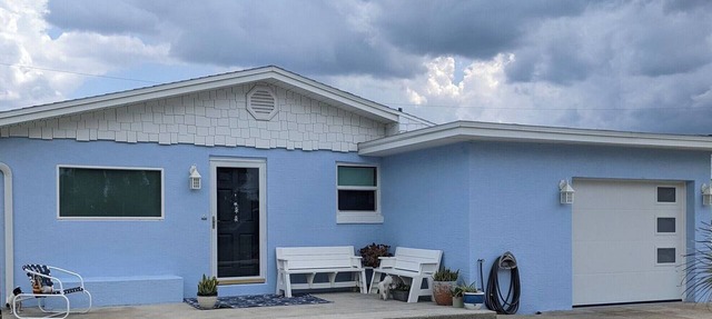 Steps from the beach with pool! in Ormond Beach