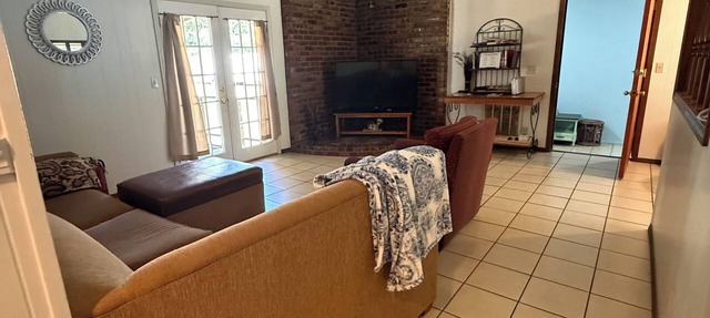 Welcome to The Lodge House, a three-bedroom, two-bath retreat made for gathering in TAHLEQUAH