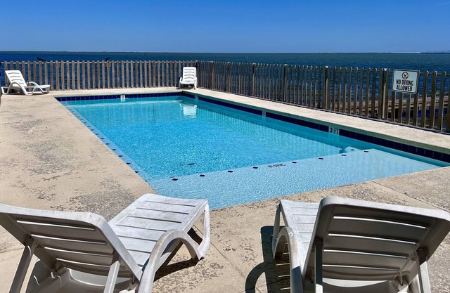 New Listing! Near the Water with Private Pier, Boat Slip & Community Pool! in Corpus Christi
