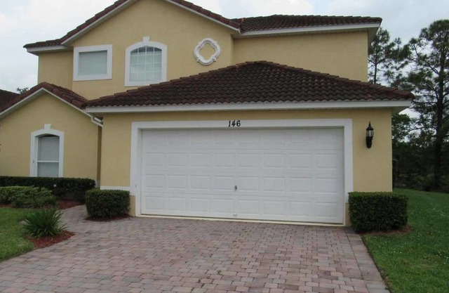 Two story, spacious 4/3 Pool Home at Lake Wilson Preserve. Backed to a conservation area for enhance in DAVENPORT
