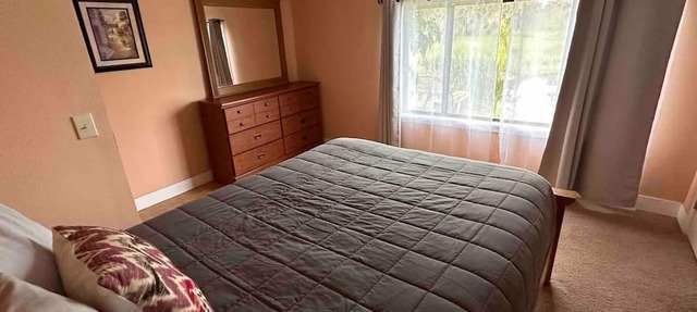 A practical, no-frills 2BR canal-front stay for up to 5 guests—best for anglers, work crews and guests who value location and affordability. in Oviedo