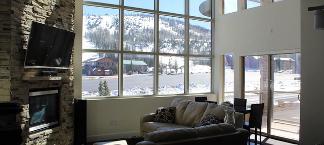 FRONT AND CENTER for 8! PANORAMIC VIEWS! Wall of windows facing slopes! GARAGE! in Brian Head